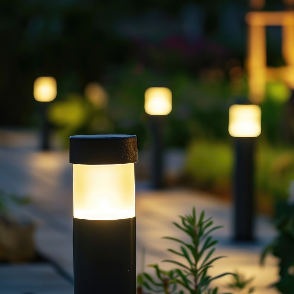 Security and Safety Professionally installed low-voltage path lighting along a garden walkway to enhance home safety, security, and curb appeal from AP Plumbing and Electrical Services