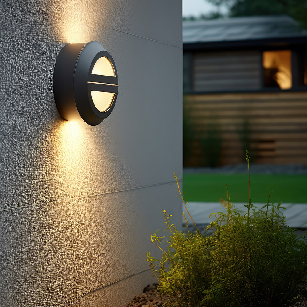 Security and Safety Modern wall-mounted motion sensor security lights illuminating an entry way, installed by AP Plumbing and Electrical Services for enhanced home security and energy efficiency
